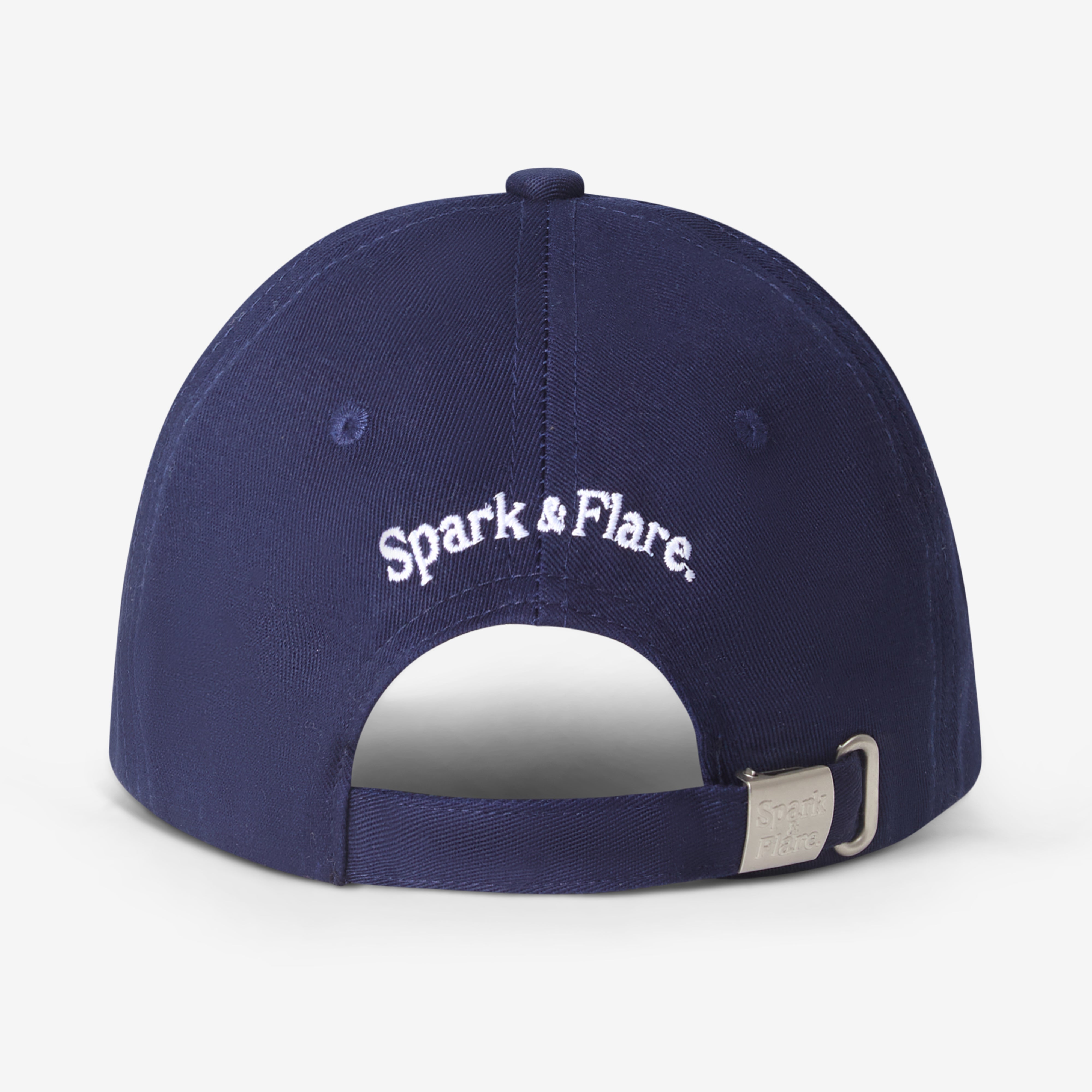 Spark & Flare navy blue cap with Spark & Flare branding and branded clasp