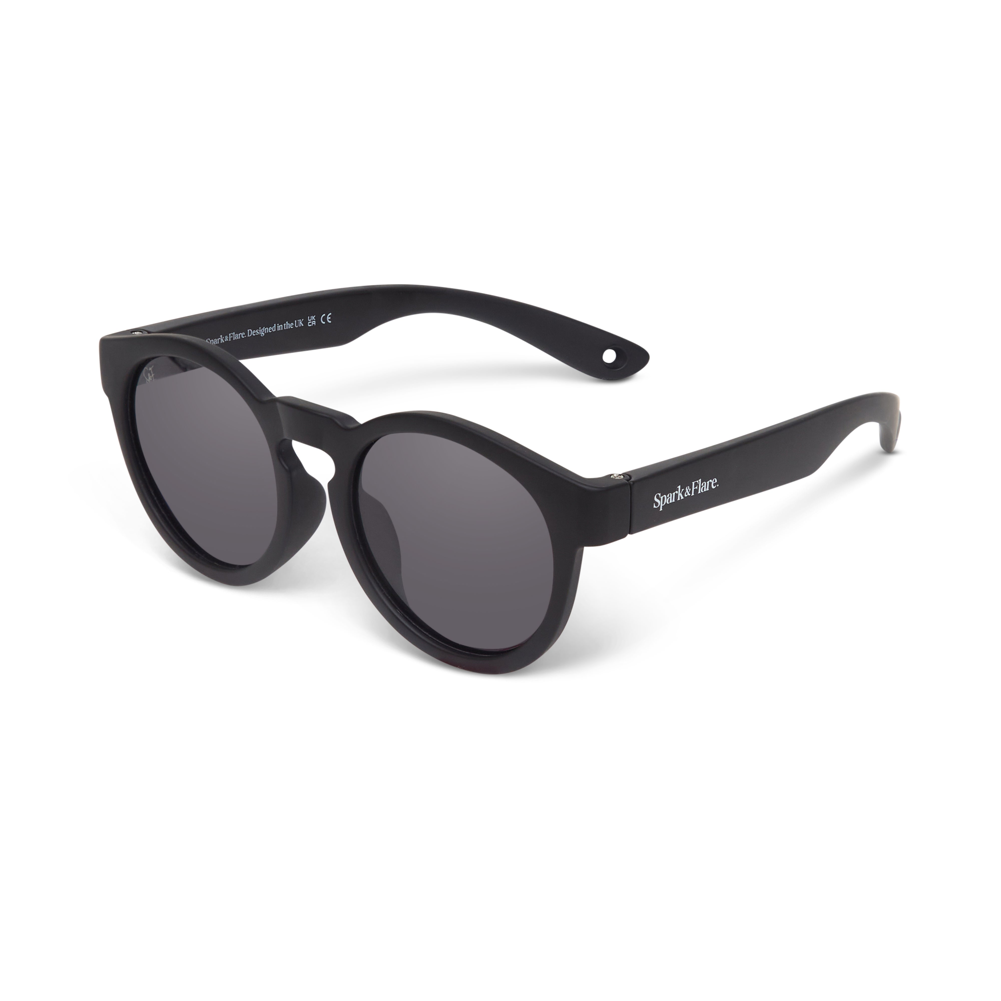 Black Spark & Flare round sunglasses with dark lenses on a white
