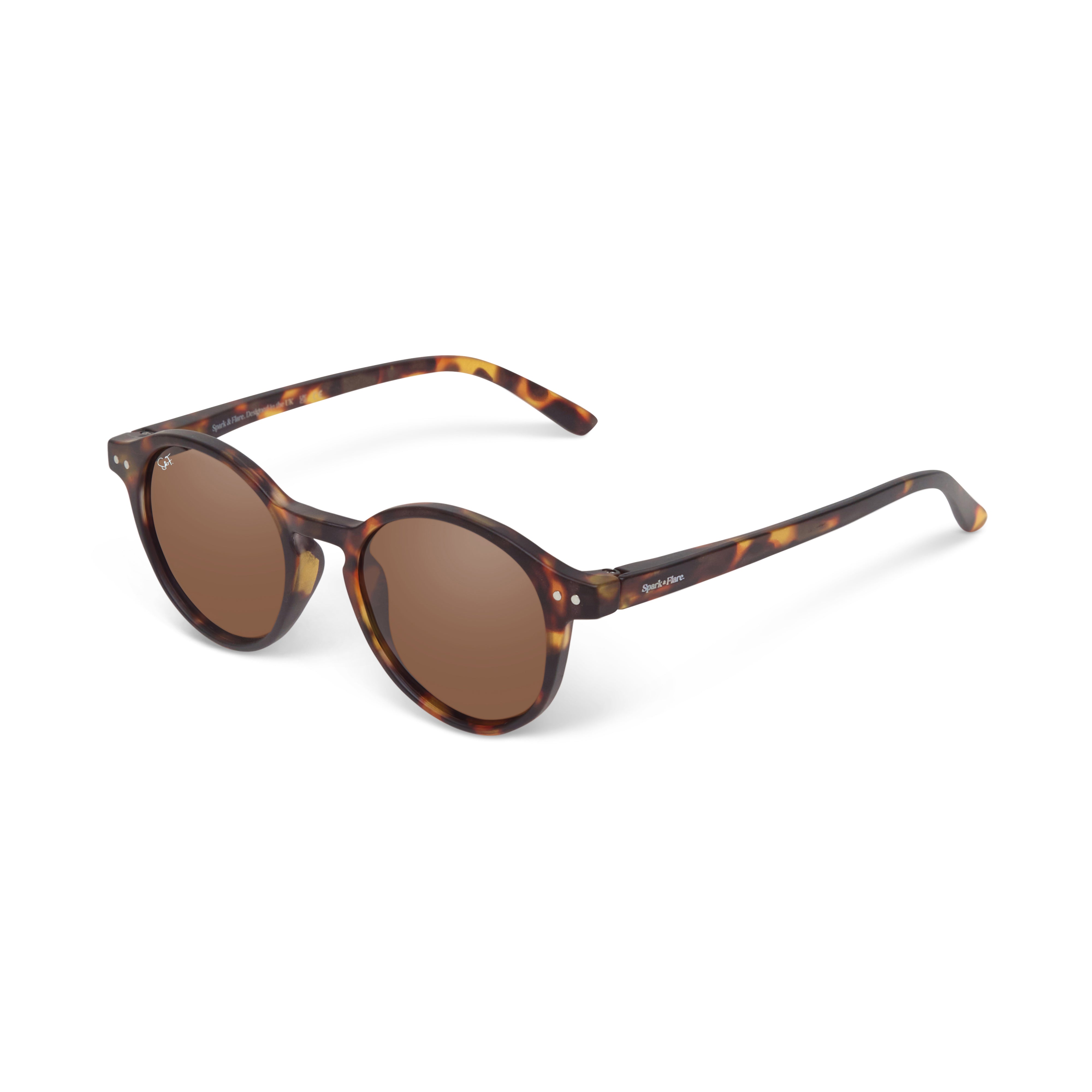 Tortoise shell Spark & Flare round sunglasses with dark lenses on a white background