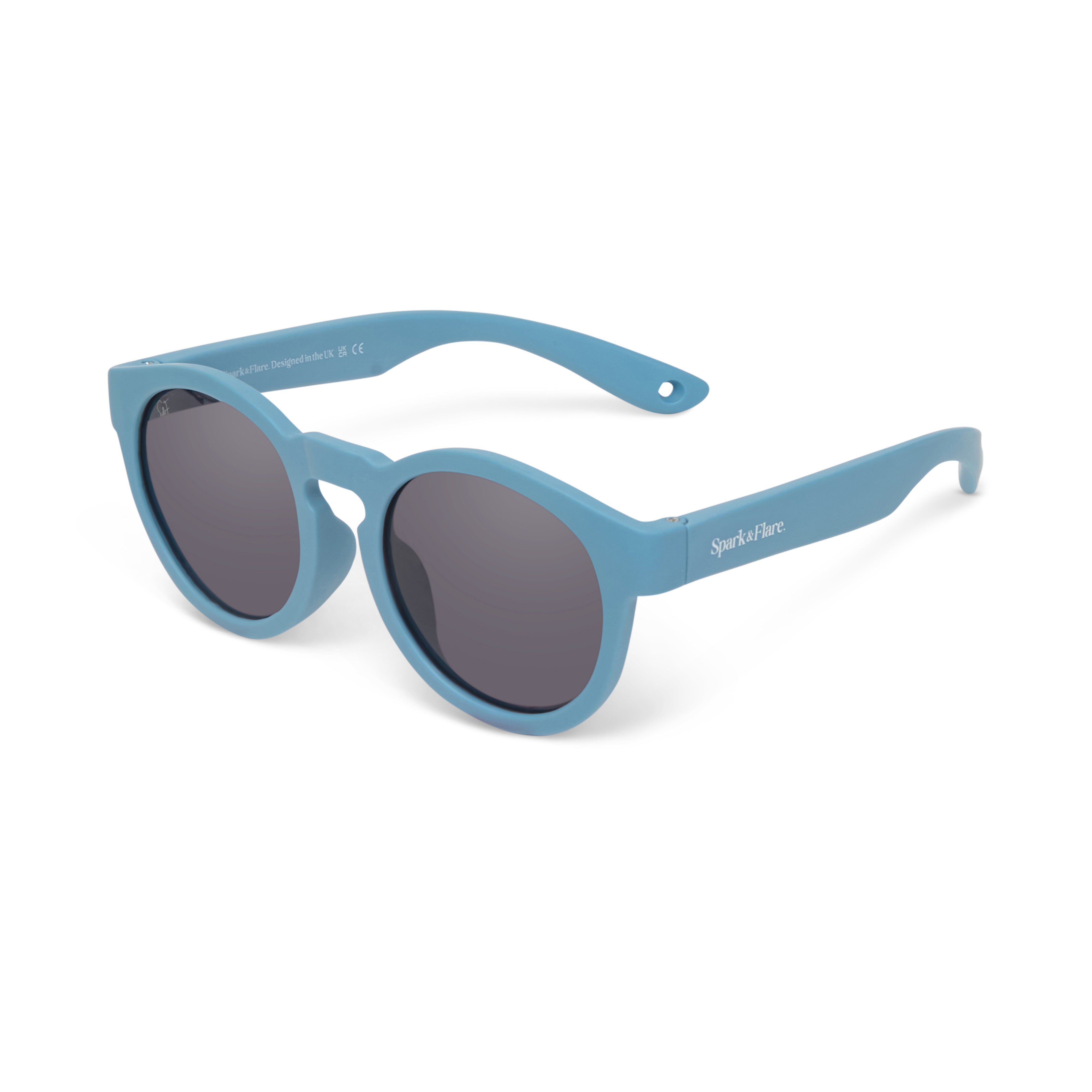 Blue Spark & Flare round sunglasses with dark lenses on a white background