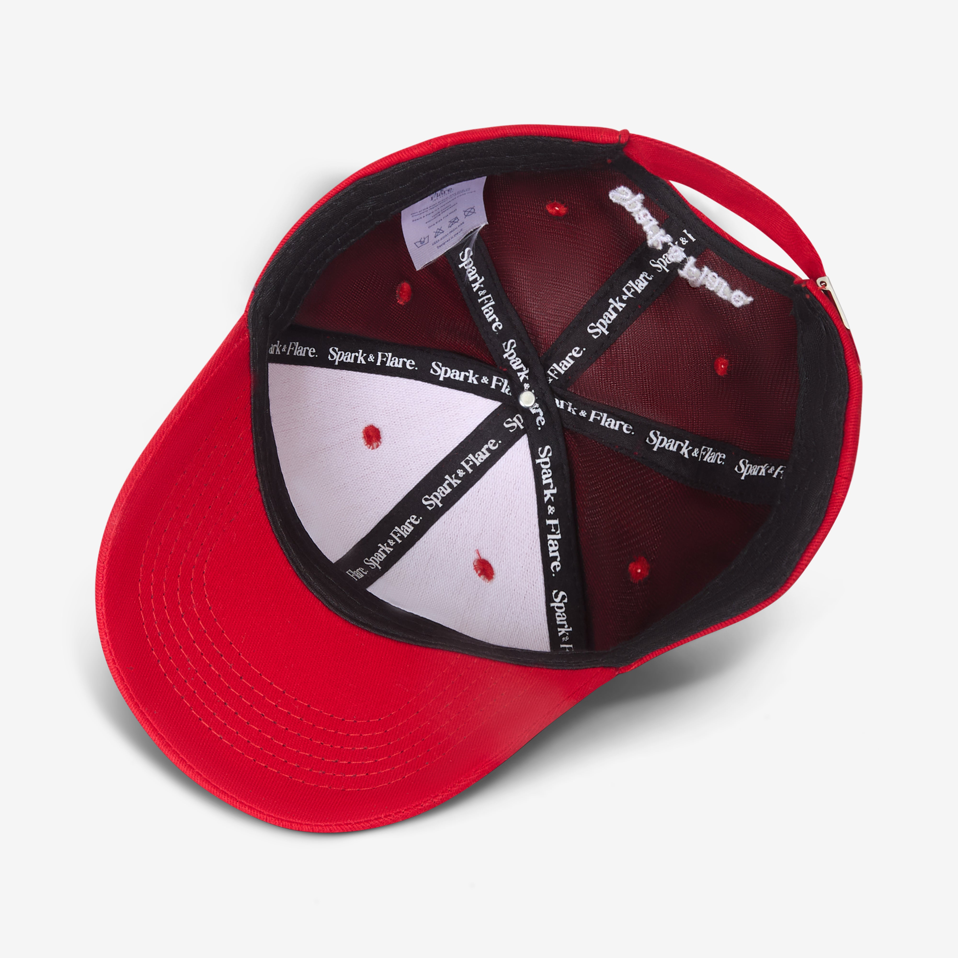 Red Spark & Flare cap with black and white interior and branded lining on a white background