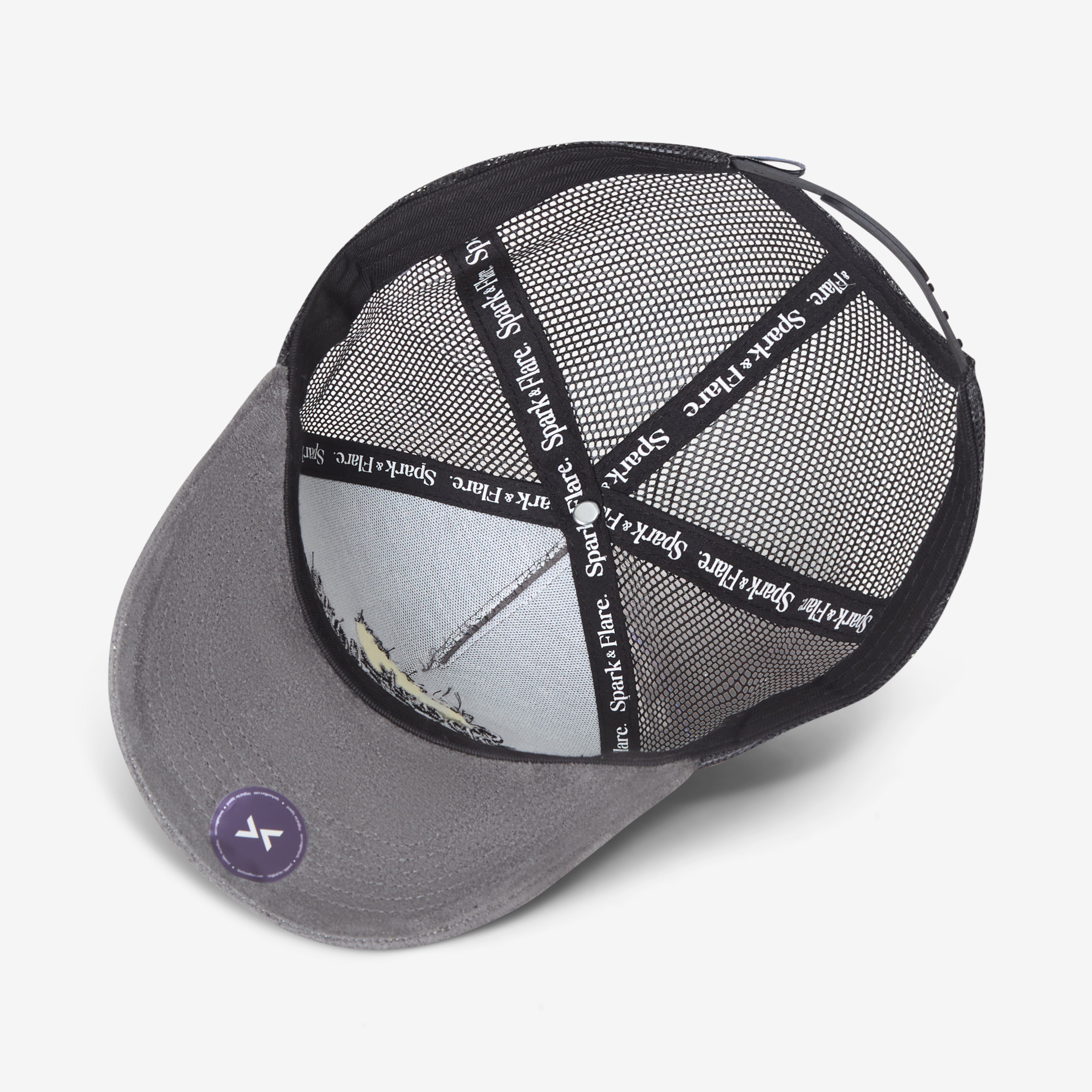 Inside of a Grey Trucker cap with 'Spark & Flare' branding on a white background
