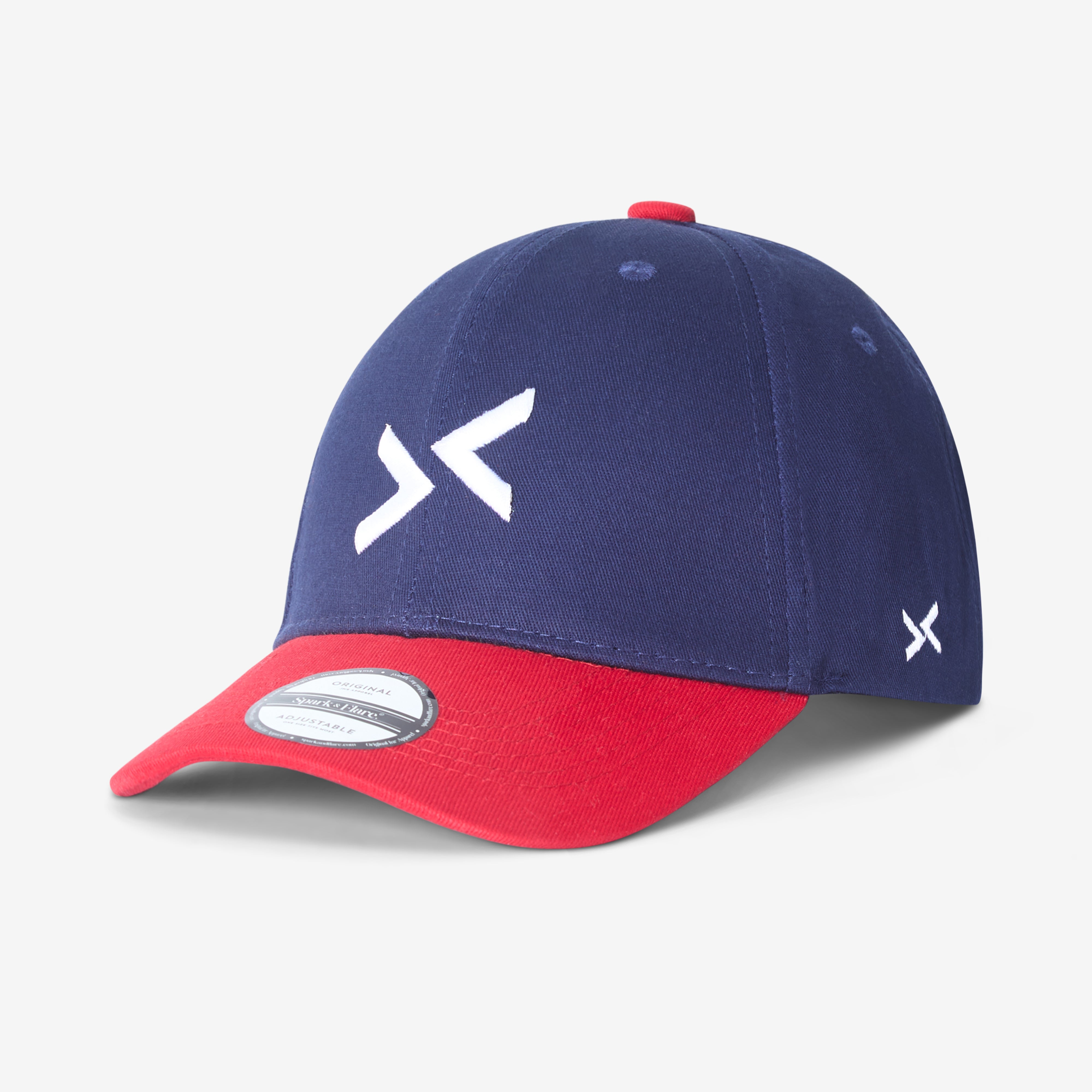 Navy and red cap with Spark & Flare arrow logo in white