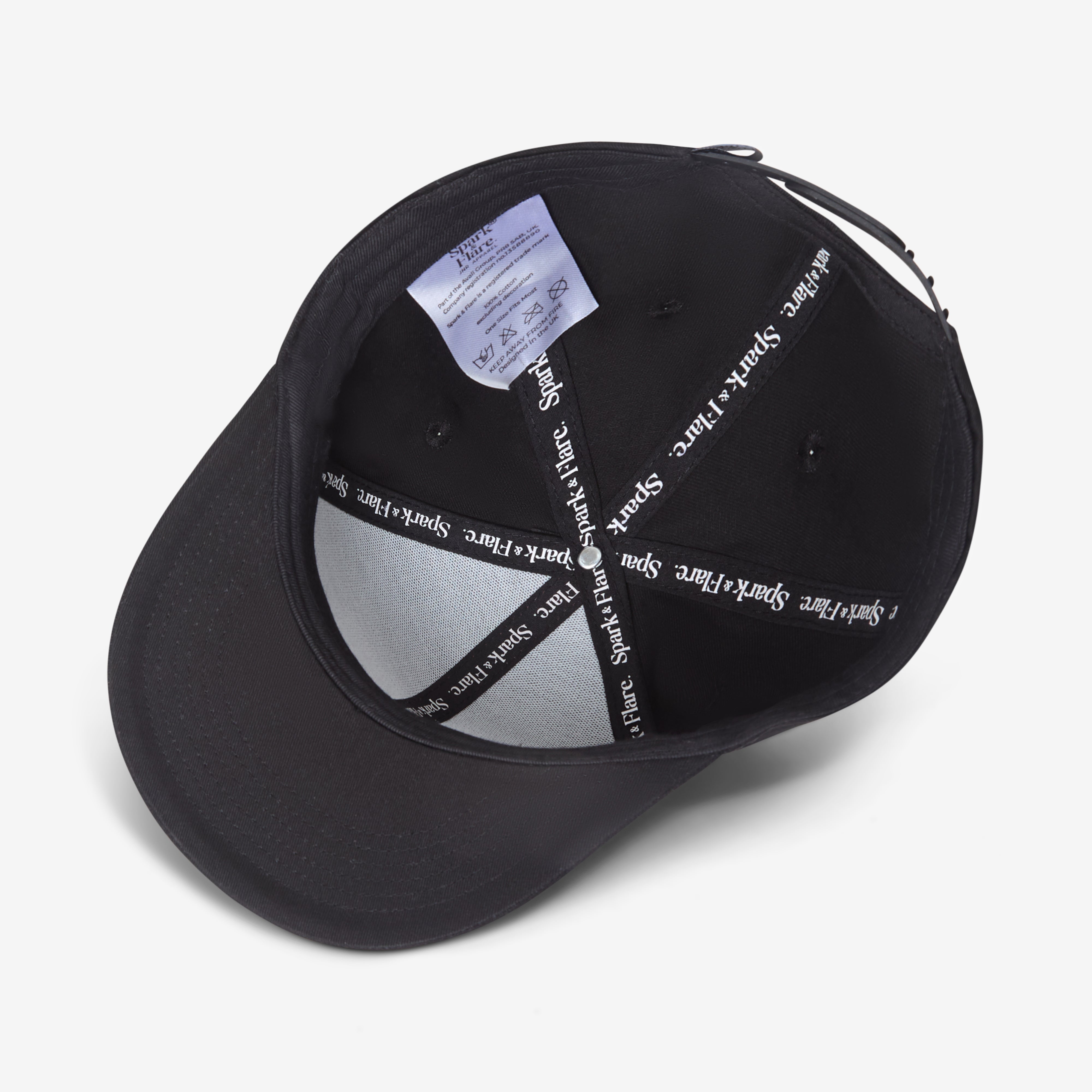 Inside of a Black Spark & Flare Fierce flat brim cap with branded lining