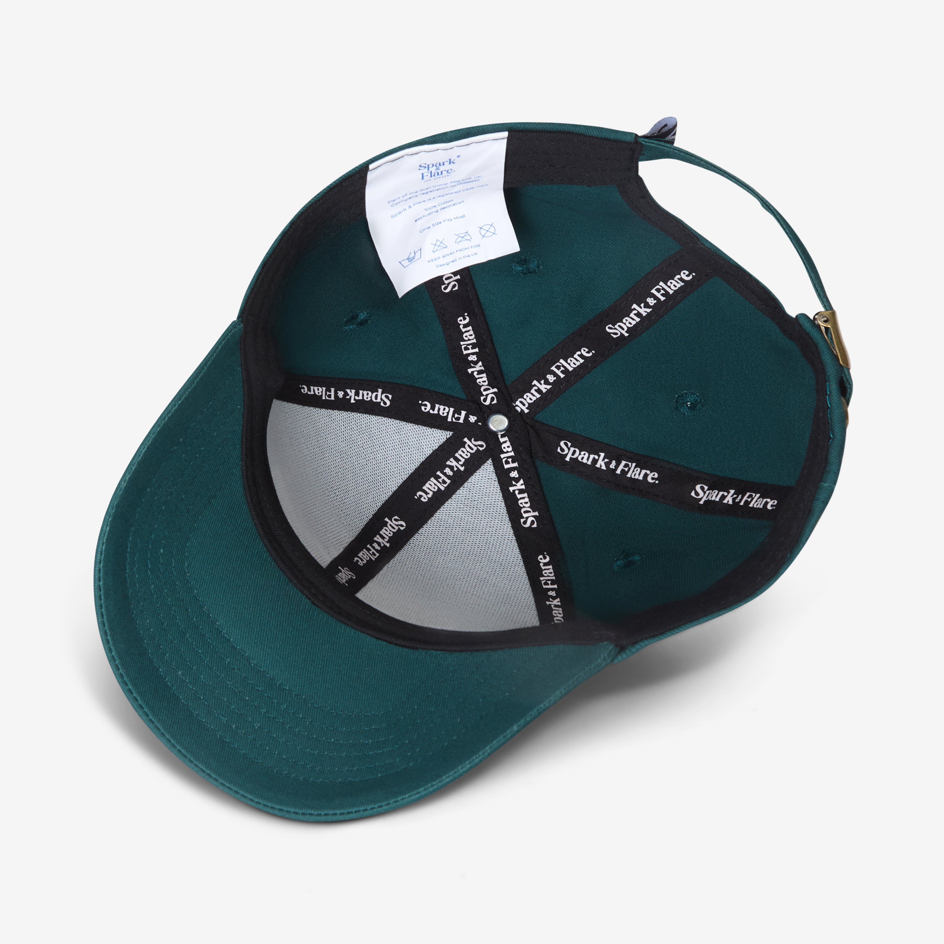 Inside of a Teal Spark & Flare Baseball cap with branded lining