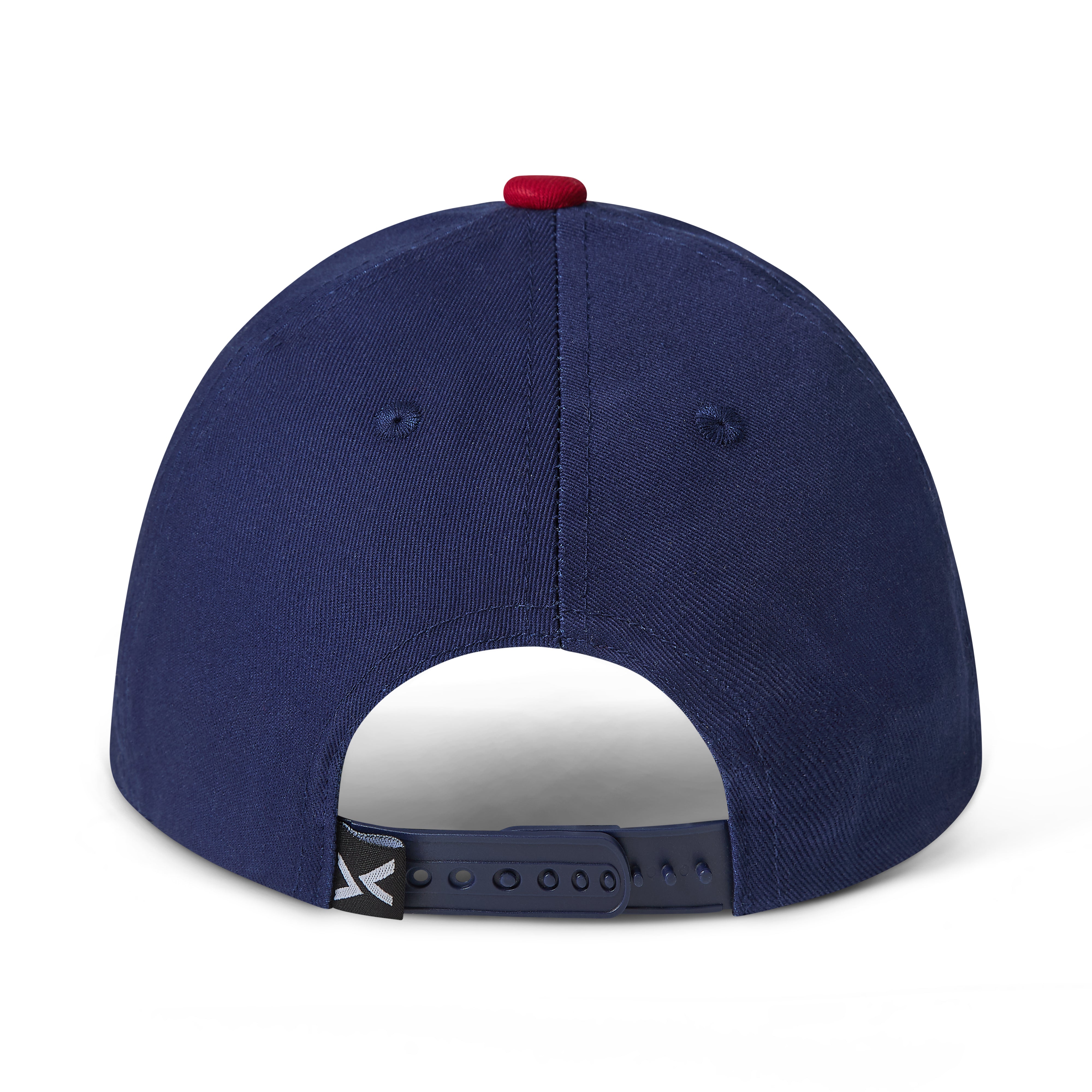 The back view of a navy blue baseball cap with a red button on top and a black adjustable strap with a small white logo.