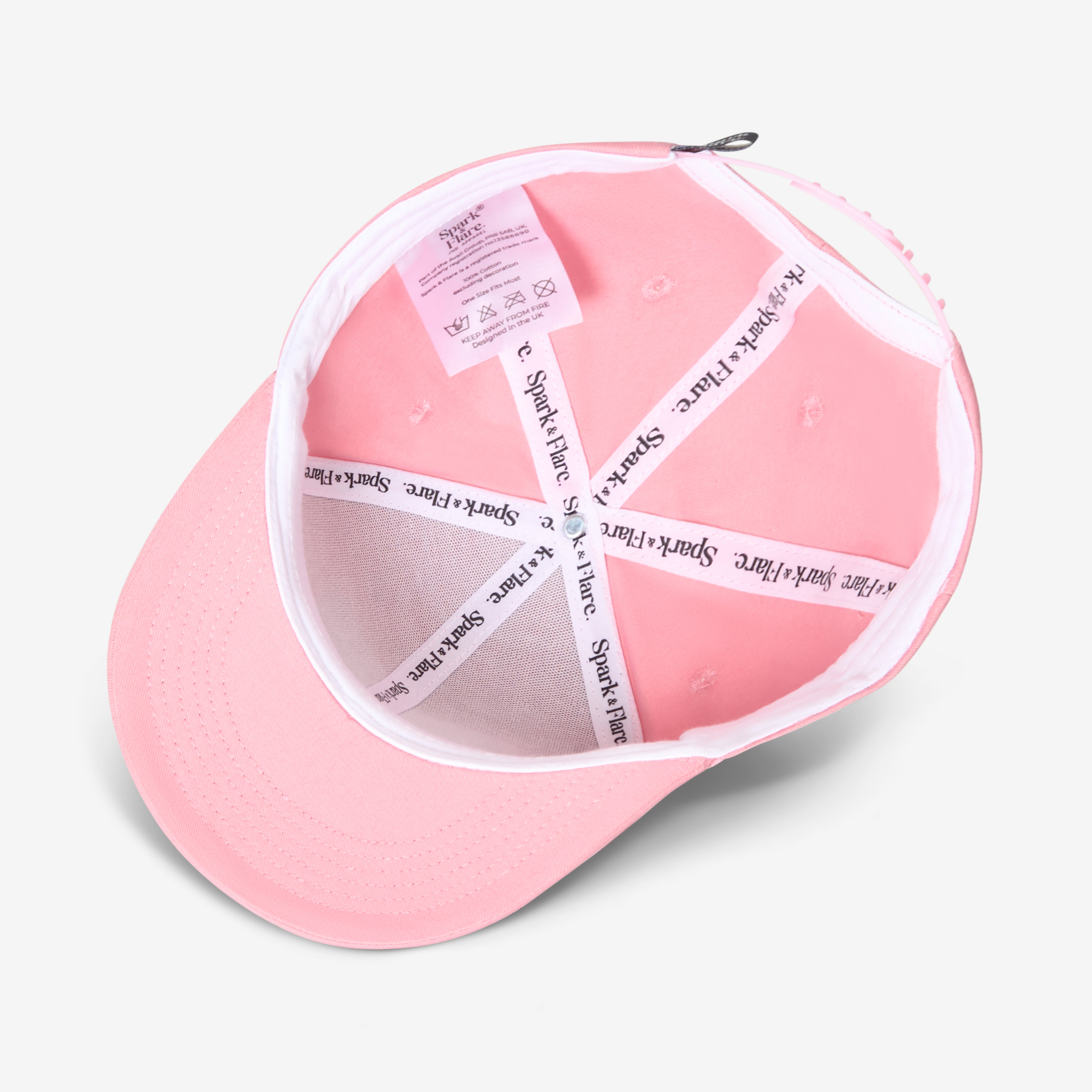 Inside of a Pink Spark & Flare Fierce flat brim cap with branded lining
