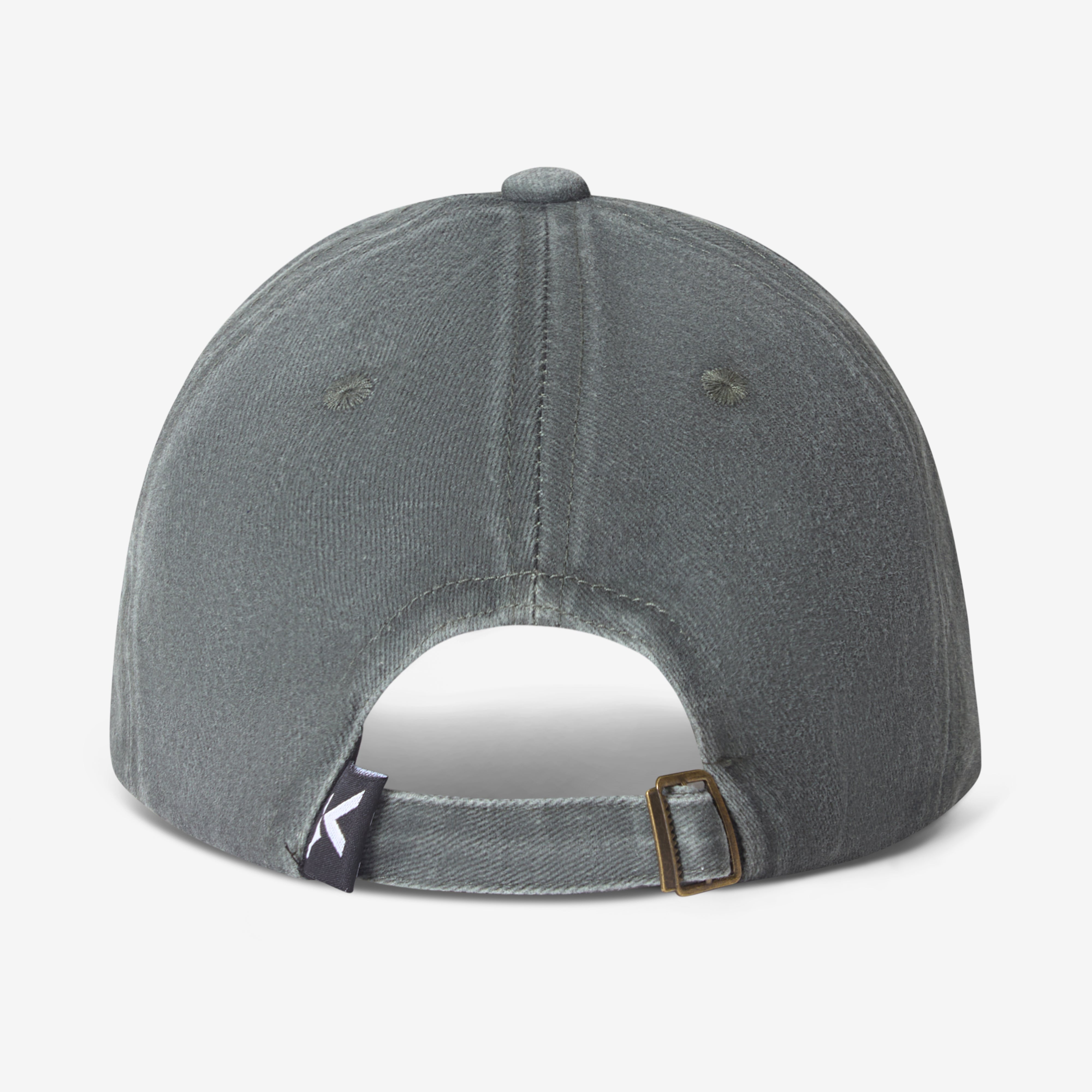 Back of a washed green Spark & Flare baseball cap with branded label and buckle